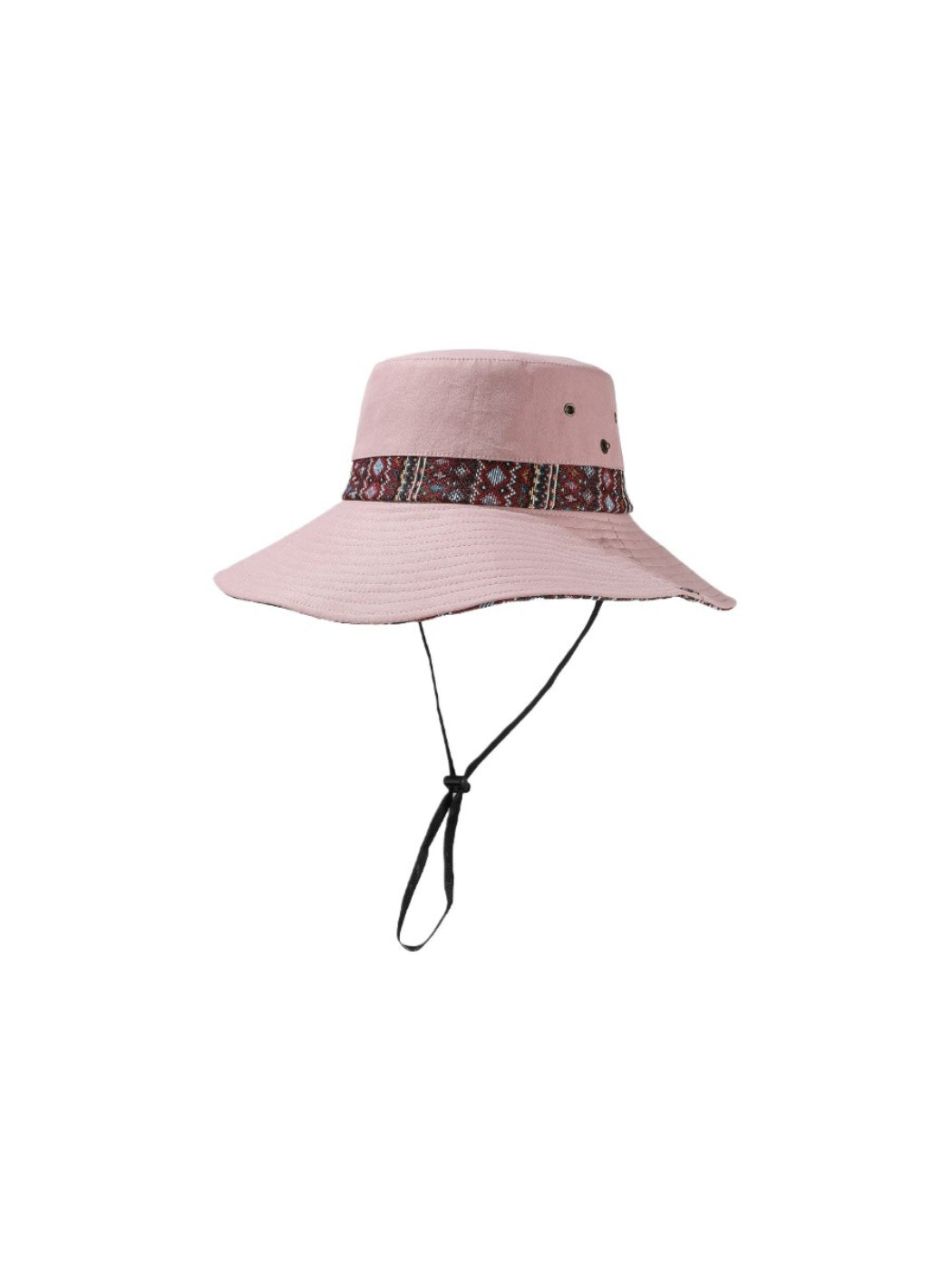 Haila cowboy hat placed on wooden surface showcasing patterned brim
