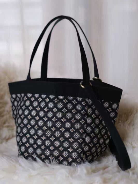 Cosbai black tote bag with tile pattern displayed on white background