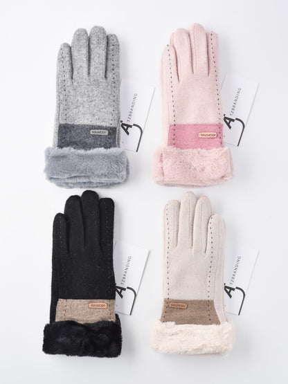 Pair of black Gloving windproof blending gloves displayed flat on white background