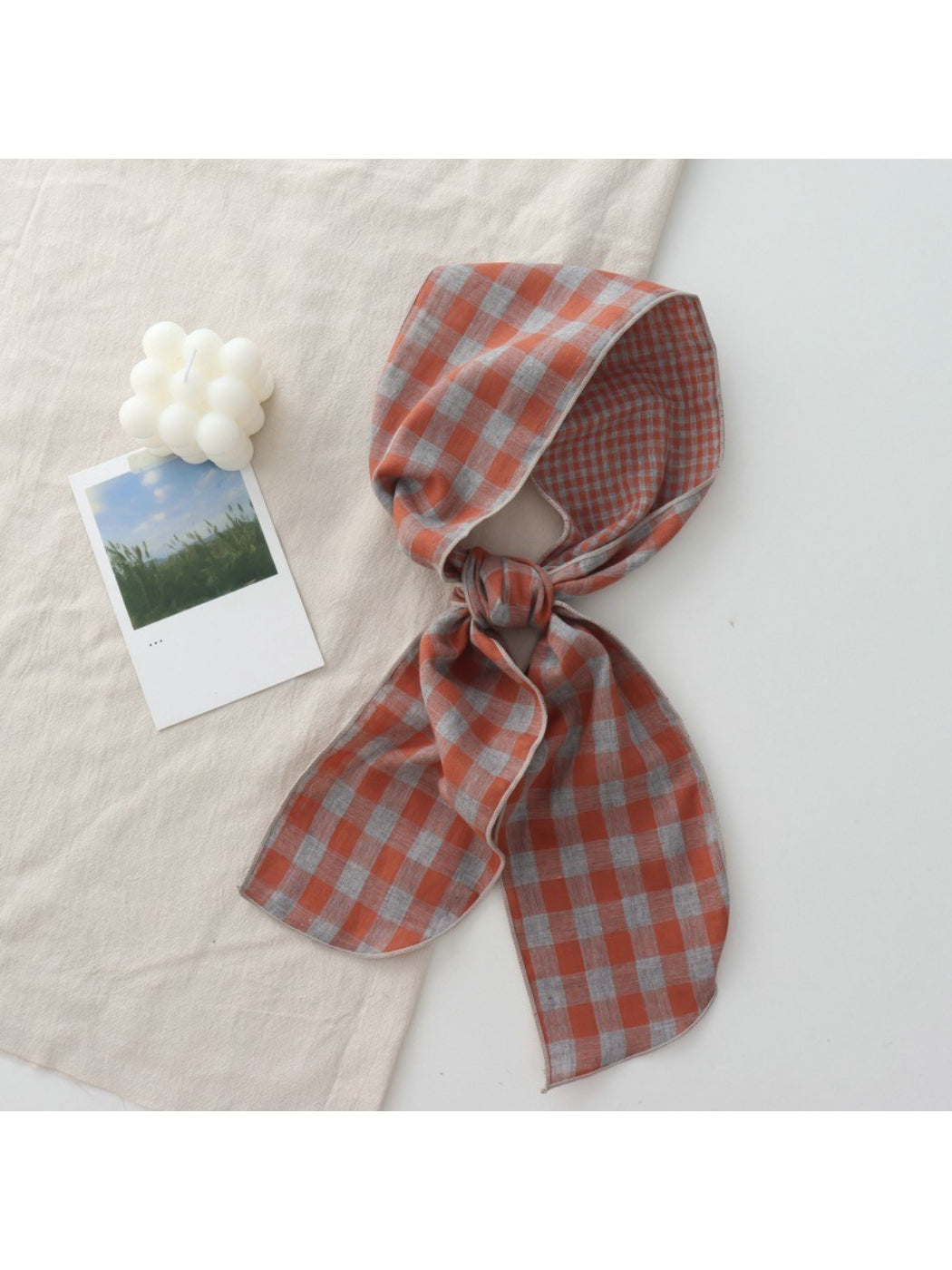 Scarvii Everyday Plaid Skinny Scarf wrapped around neck with ends hanging down