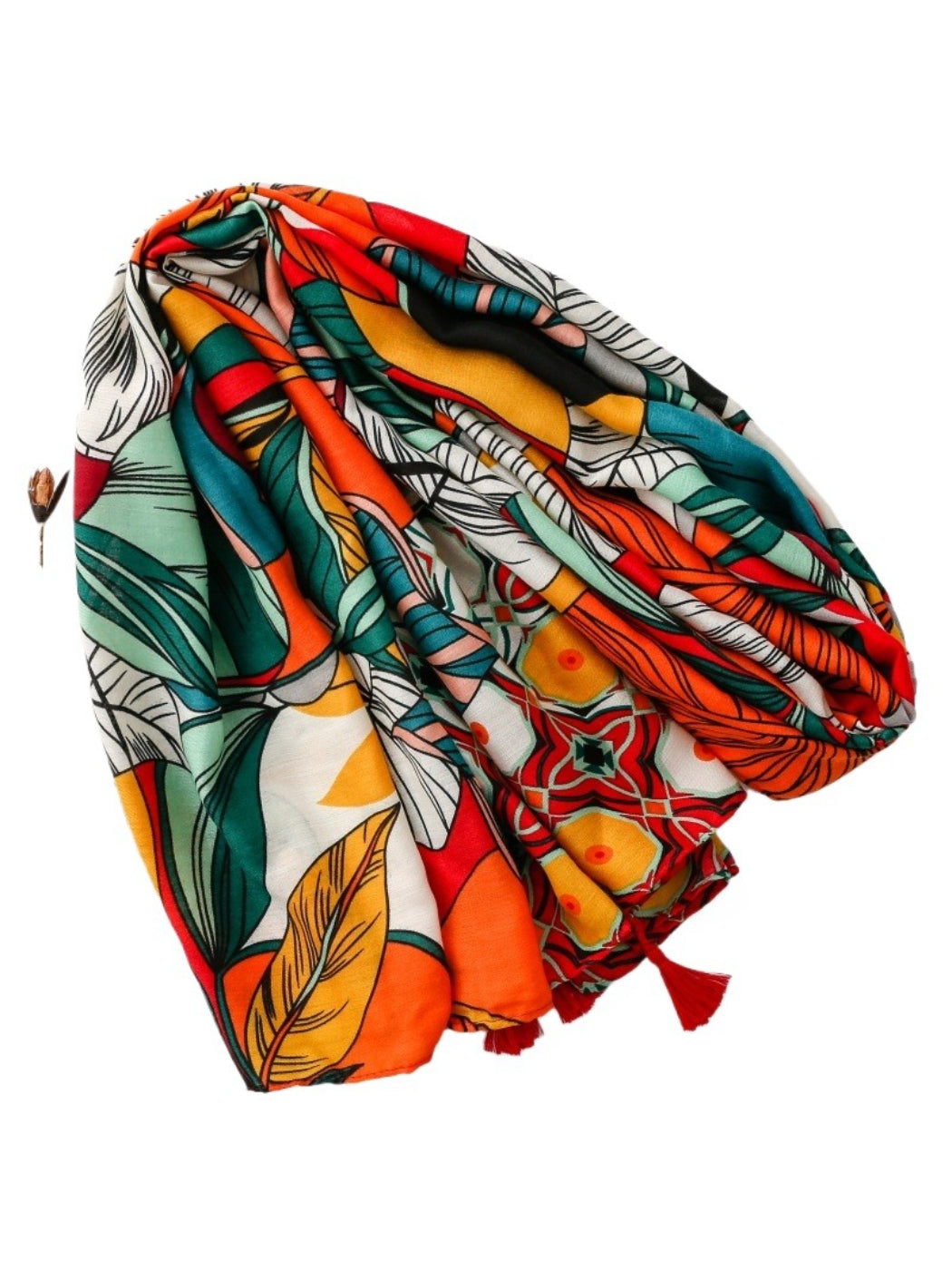 Model wearing Scarvii tropical print scarf styled around the neck with tassels visible