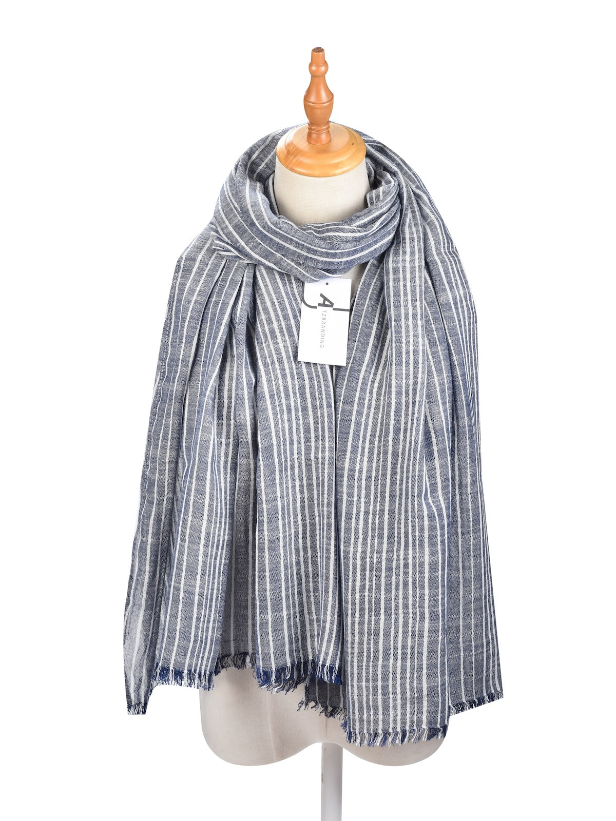 Model wearing Scarvii striped lightweight scarf draped around neck