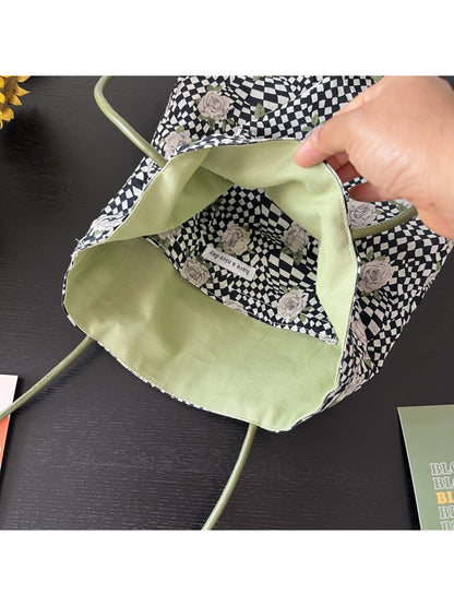 Side view of Cosbai Checker Rose Drawstring Bag highlighting drawstring straps