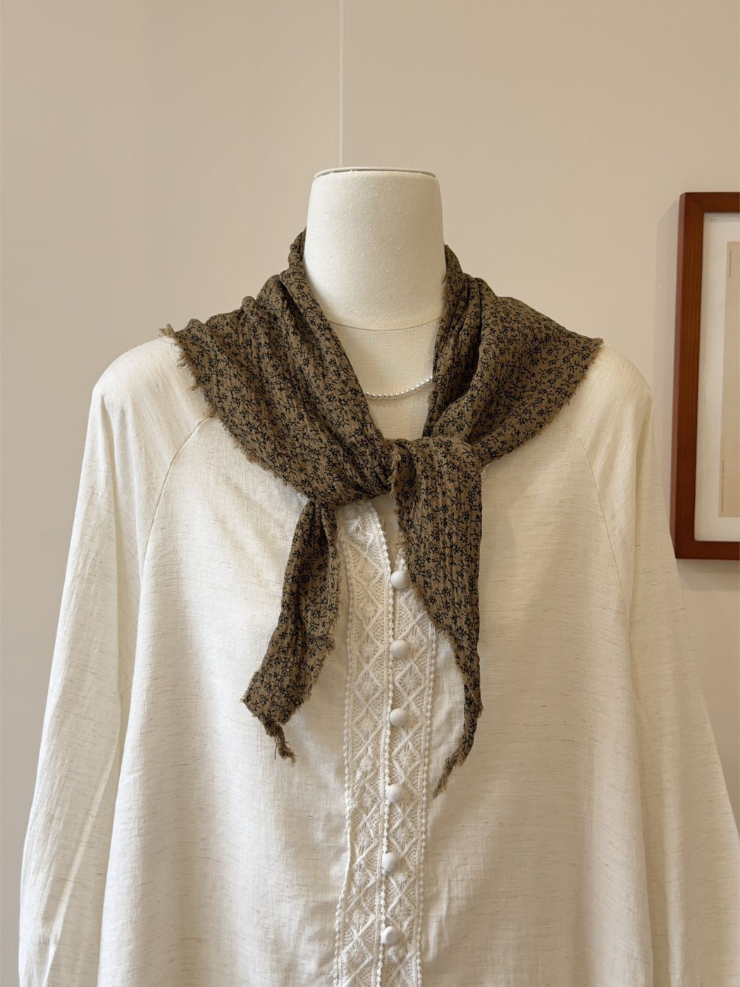 Scarvii vintage floral triangle scarf styled as a headband on model