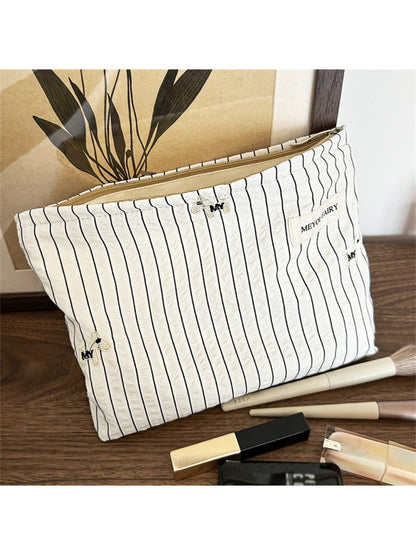 Top view of Cosbai Classic Pinstripe Cosmetic Organizer displaying spacious interior