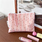 Cosbai floral cartoon cosmetic bag shown from an angle emphasizing the floral cartoon artwork