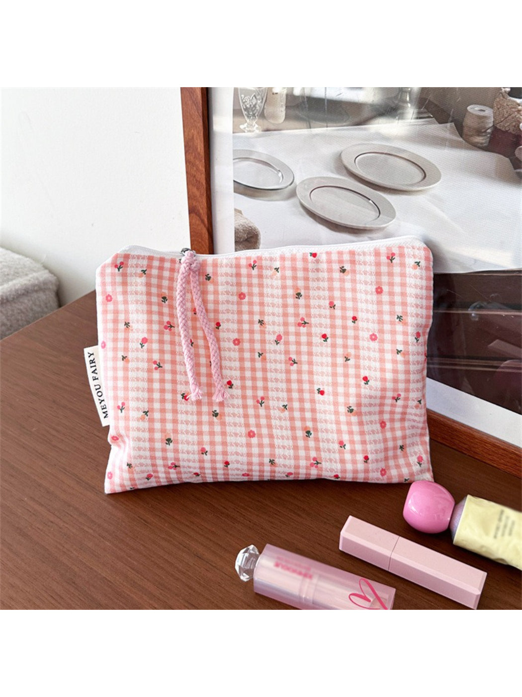 Cosbai floral cartoon cosmetic bag shown from an angle emphasizing the floral cartoon artwork