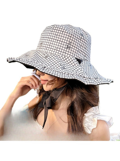 Haila soft check bucket hat in beige and brown check pattern, front view