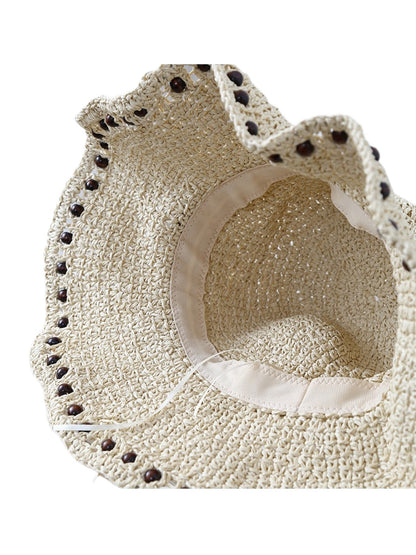 Haila crochet bucket hat with beaded edge displayed on flat surface