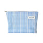 Cosbai blue check cosmetic bag standing upright with visible zipper on top