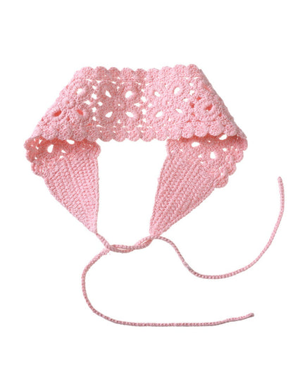 Model wearing Scarvii crochet lace knit headband with hair pulled back