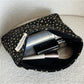 Cosbai Black Star Cosmetic Bag laying flat showing full star pattern on black surface