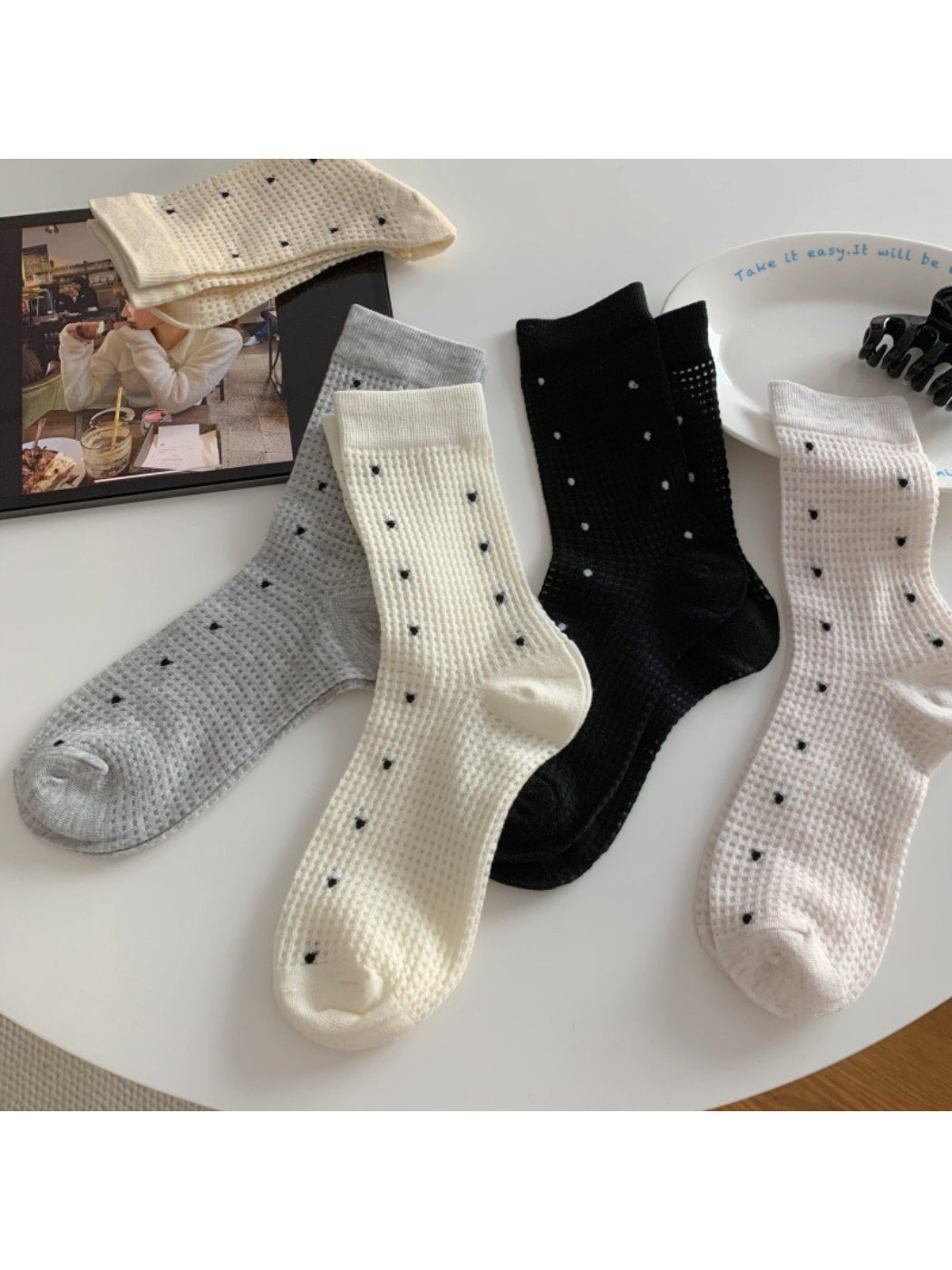 Pair of Rufia Waffle Dot Crew Socks in beige with waffle texture and dot pattern