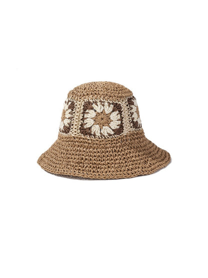 Haila bucket hat worn by model, showing fit and flower patch design