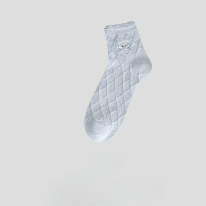 Side view of Rufia Sweet Bear Diamond Knit Socks highlighting knit texture and bear motif