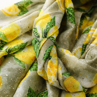 Green lemon foil print fringed wrap scarf fabric detail