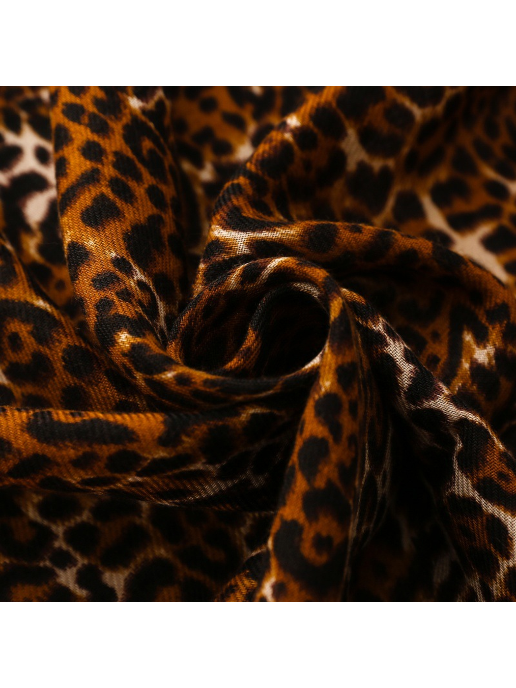 Close-up of the Brown leopard-print scarf gathered into layered folds