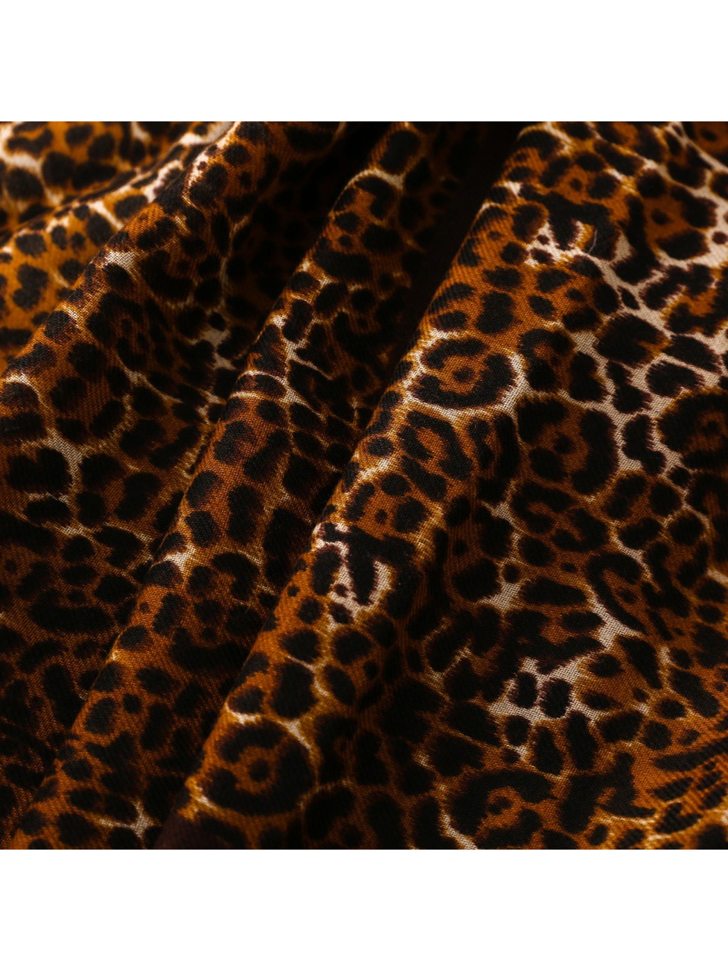 Close-up of the Brown leopard print and fine surface weave