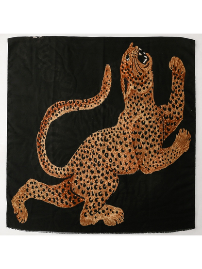 Leopard square scarf with tan and rust animal motif on black