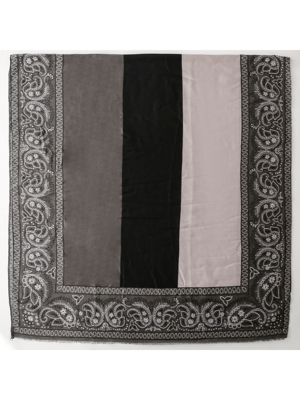 Black and gray color-block paisley scarf laid flat with short fringe