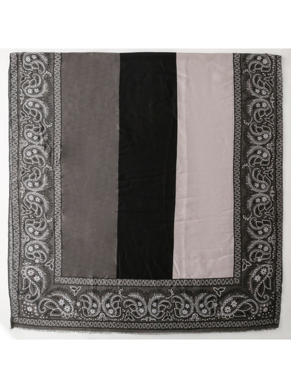 Black and gray color-block paisley scarf laid flat with short fringe