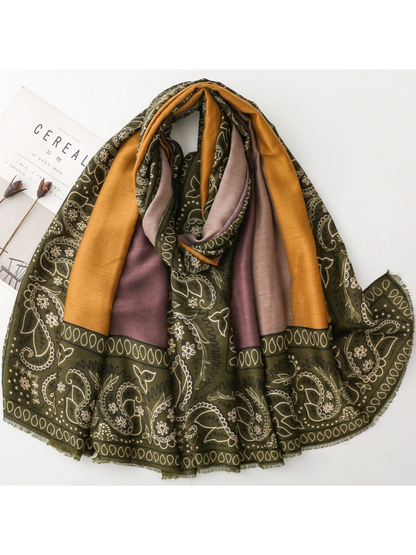 Olive green, mustard yellow and mauve paisley scarf in a full draped view