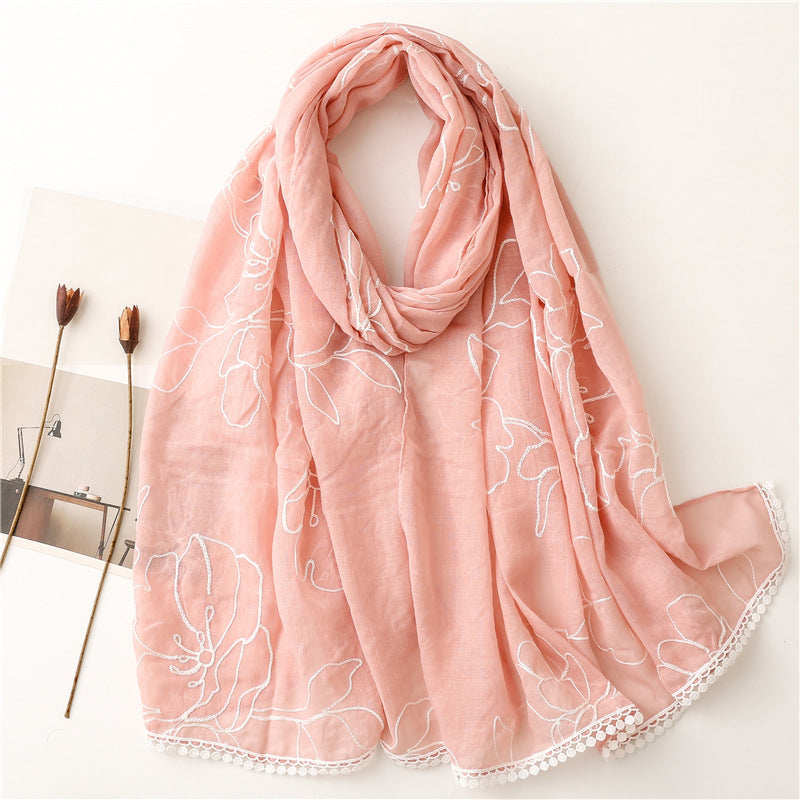 Pink floral embroidered lace trim shawl in a draped product view