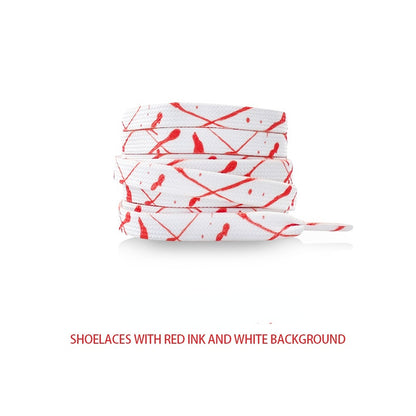 Pair of Shoeya Splash flat shoelaces laid out straight highlighting colorful paint splatter