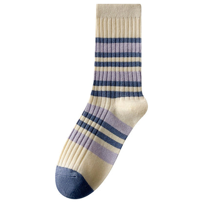 Stack of Rufia contrast stripe socks folded to display different color stripes