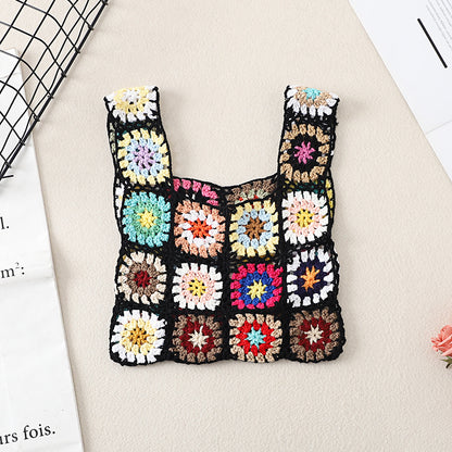Cosbai Bohemian vintage crochet bag with strap coiled beside it