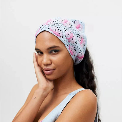 Close-up of woven vintage hairband in beige fabric with textured pattern