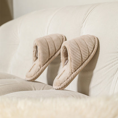 Close-up of the textured corduroy fabric on a brown slipper