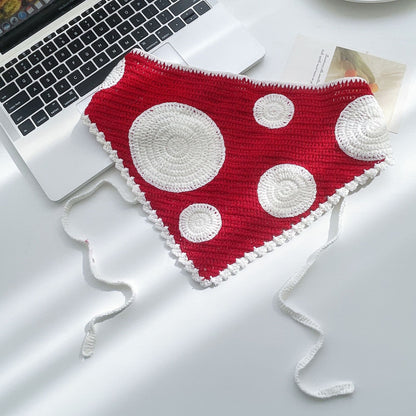 Top view of woven vintage hairband showing intricate woven pattern
