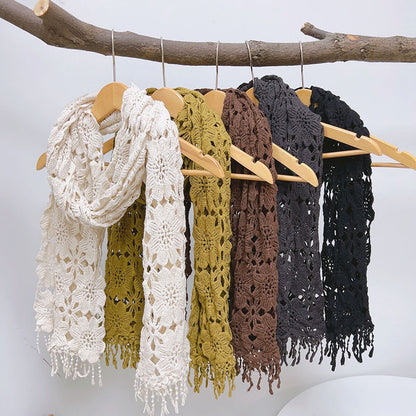 Boho crochet shawl scarf in cream color draped over a mannequin