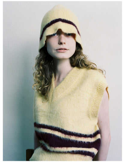 Side view of Haila knitted furry bucket hat showing texture and shape