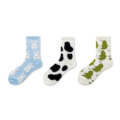 Rufia winter fleece socks paired with winter boots outdoors