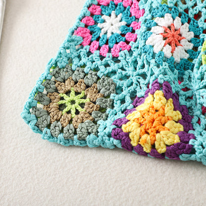 Cosbai Bohemian vintage crochet bag with strap laid flat on surface
