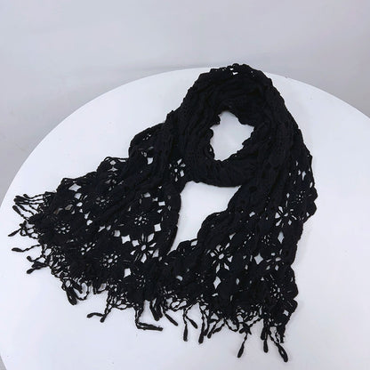 Boho crochet shawl scarf wrapped around shoulders of model