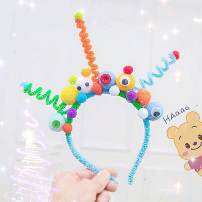 Kaca headband worn by a model smiling, featuring bright pom-poms