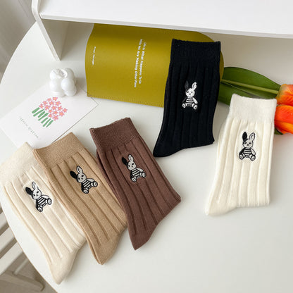 Set of four pairs of Rufia socks featuring embroidered bunny designs in pastel colors