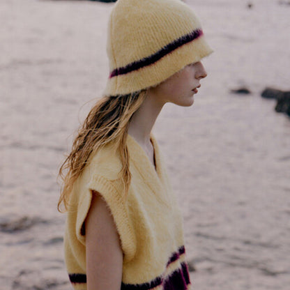 Close-up of Haila knitted furry bucket hat fabric and furry texture