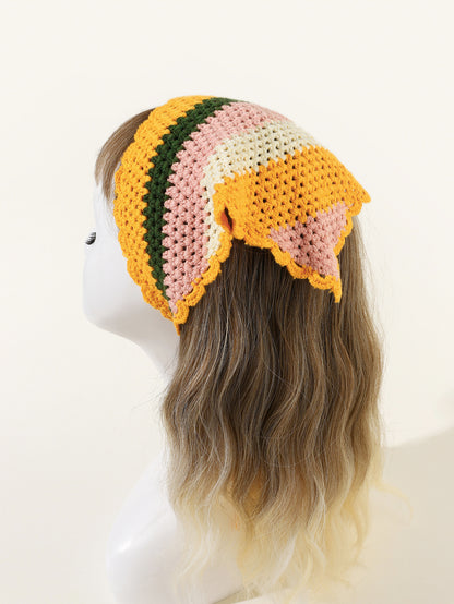Woven yellow hairband displayed on white background showing full shape