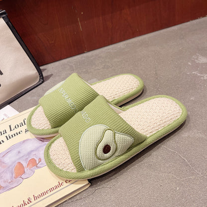Pair of Slipeer fruit indoor slippers worn on feet indoors