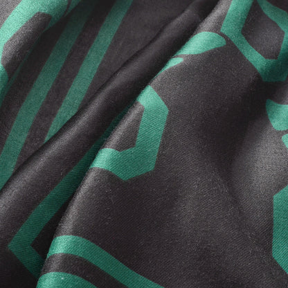 Scarvii Letter D long scarf folded neatly with visible letter D pattern