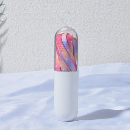 Tie dye colorful dot shoe laces displayed in a bundle with vibrant colors