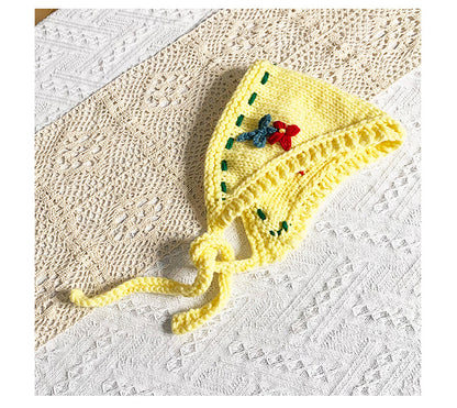 Scarvii crochet cute hairband laid flat with visible texture