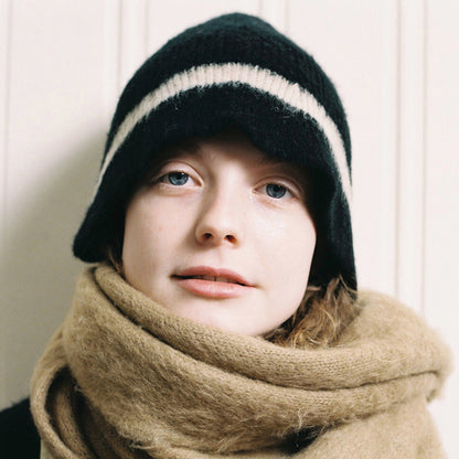 Haila knitted furry bucket hat in beige, front view on white background