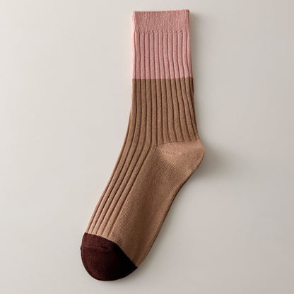 Rufia contrast stripe socks packaging with branding and product details visible