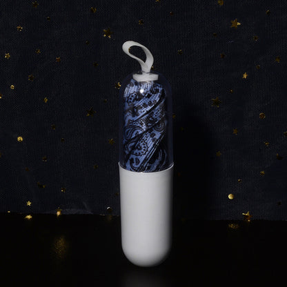 Flat lay of paisley shoe laces showing detailed floral pattern