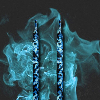 Top view of Shoeya flaming flat shoelaces in capsule packaging on white background